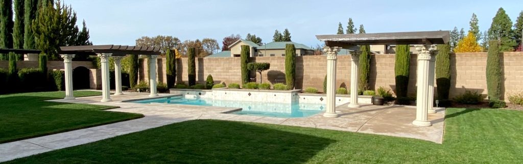 Custom column and pergola next to pool
